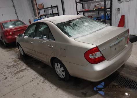 2003 Toyota Camry Le z USA, uszkodzony, nr VIN 4T1BE32K93U193235